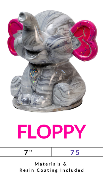 Gray elephant figurine with pink ears, labeled 'FLOPPY', 7 inches, materials & resin coating included.