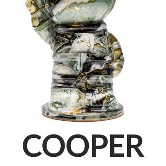 Marble-patterned astronaut figure labeled COOPER, 8 inches tall.