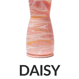 Colorful flowers in a pink marbled vase labeled 'DAISY' with size '8