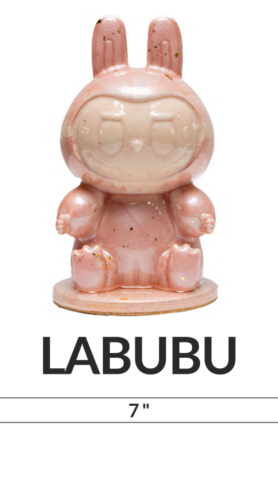 Pink rabbit-like figurine with 'LABUBU' and '7