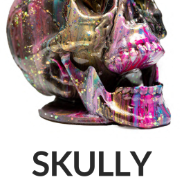 Colorful galaxy-patterned skull with the label 'SKULLY' and size 8 inches.